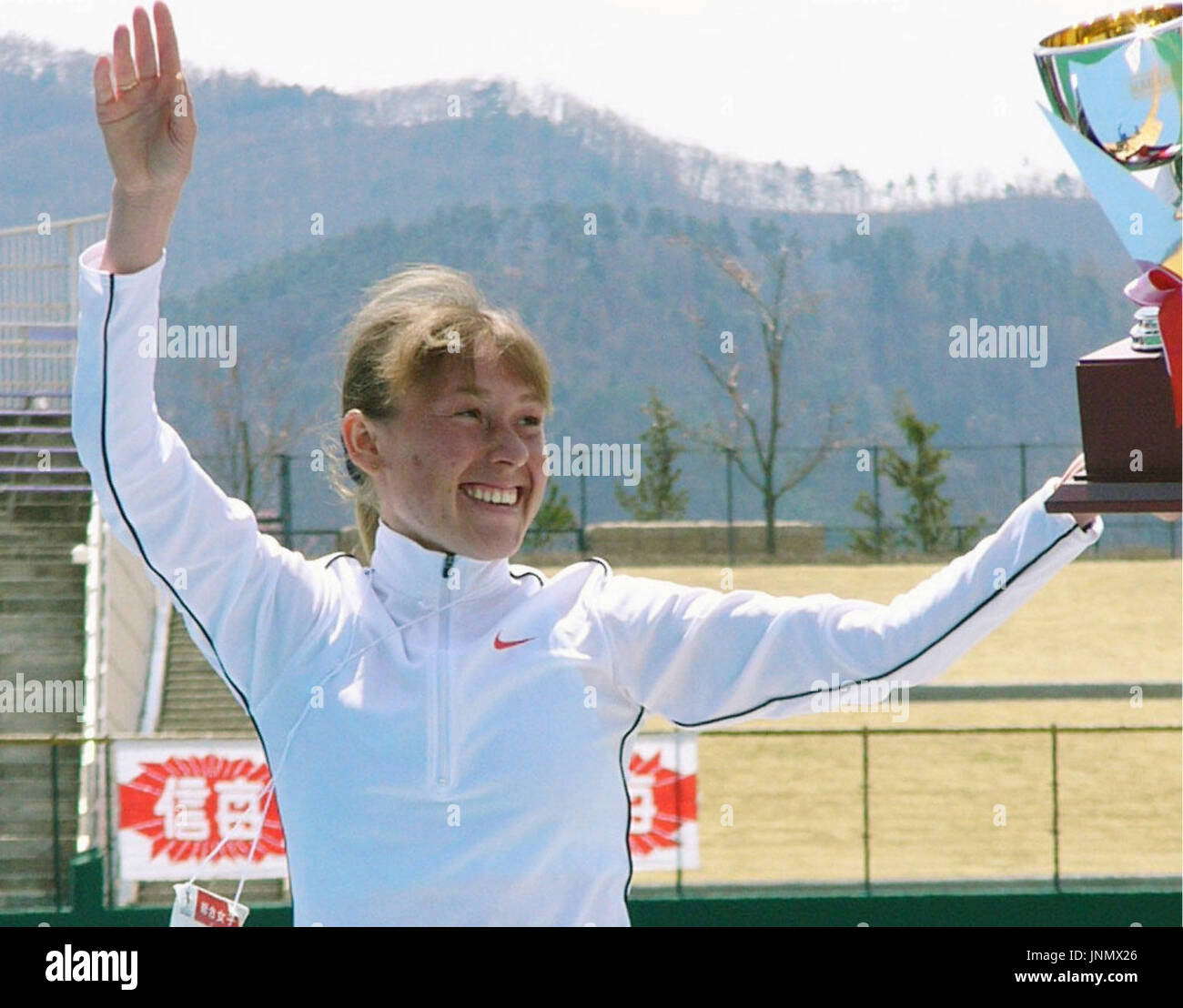 NAGANO, Japan - Russian Albina Ivanova holds up her trophy at Olympic ...
