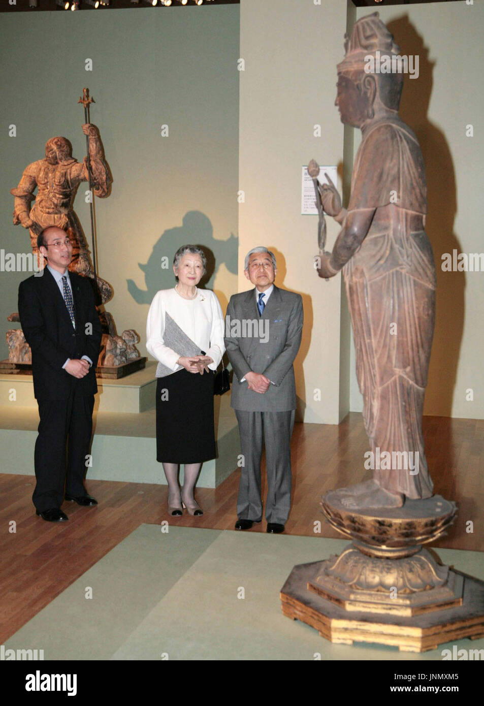 TOKYO, Japan - Emperor Akihito and Empress Michiko look at an Buddhist ...