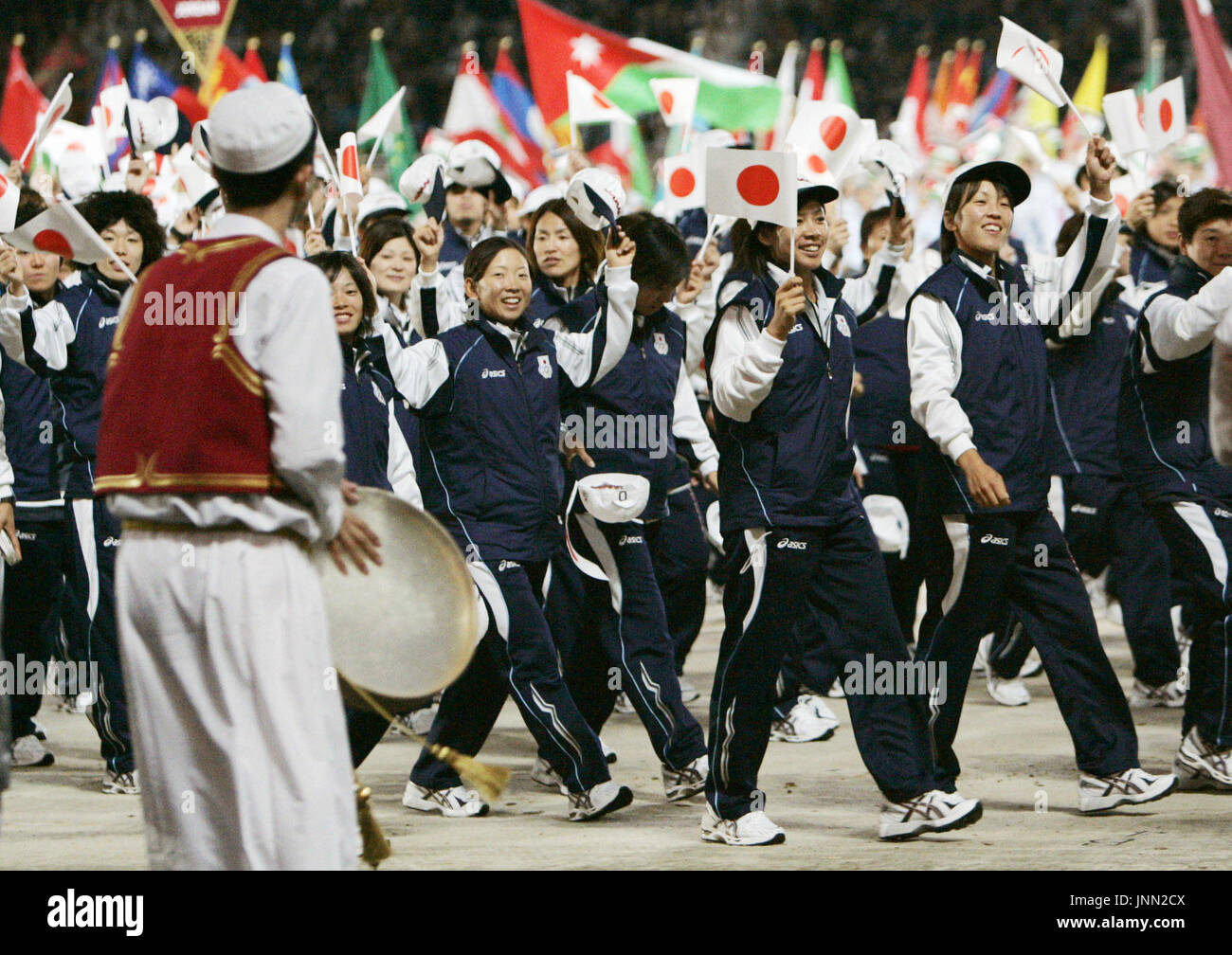 DOHA, Qatar - Japanese athletes march during the opening ceremony of ...
