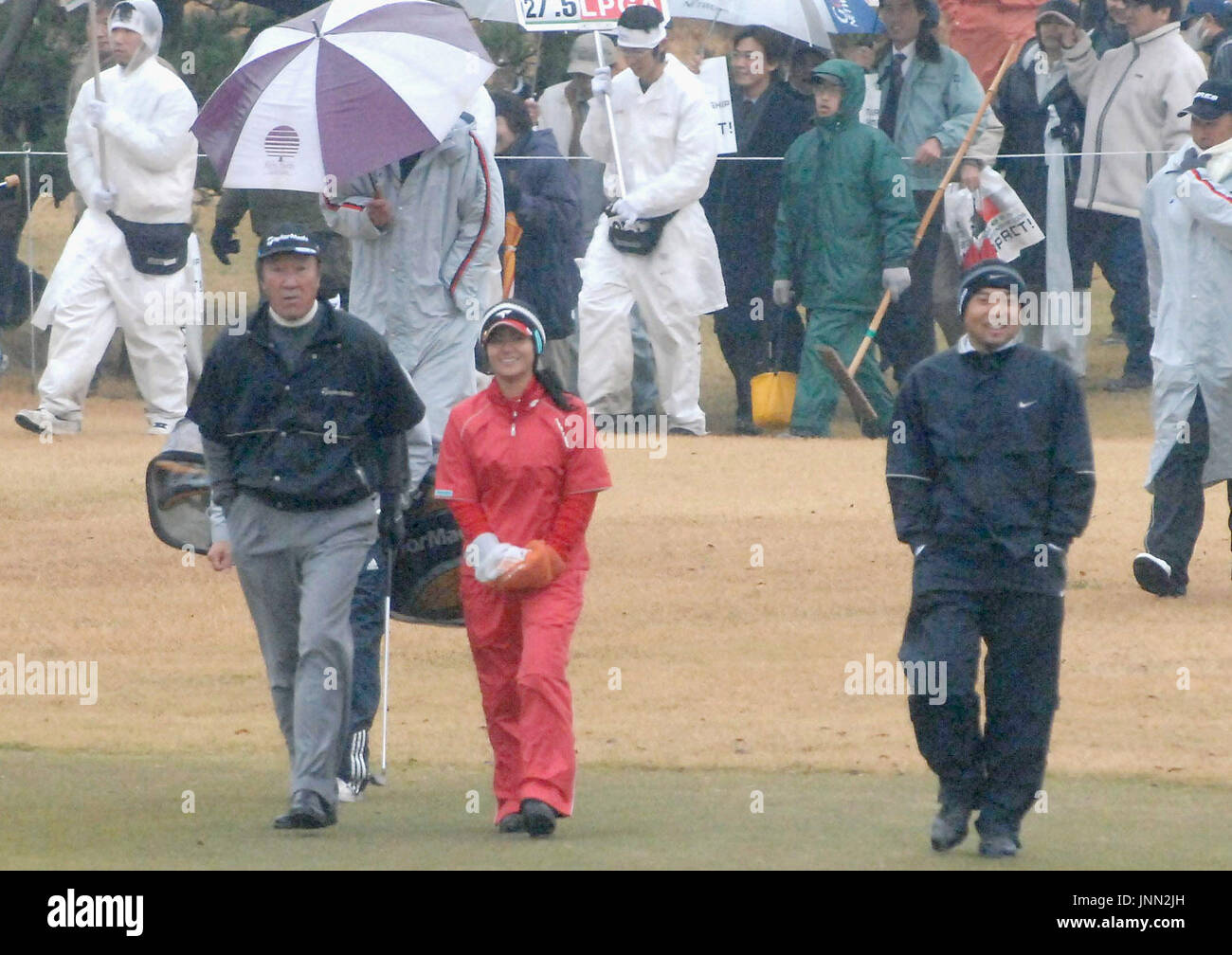 ICHIHARA, Japan Ai Miyazato (C) plays with Isao Aoki (L) and Shingo