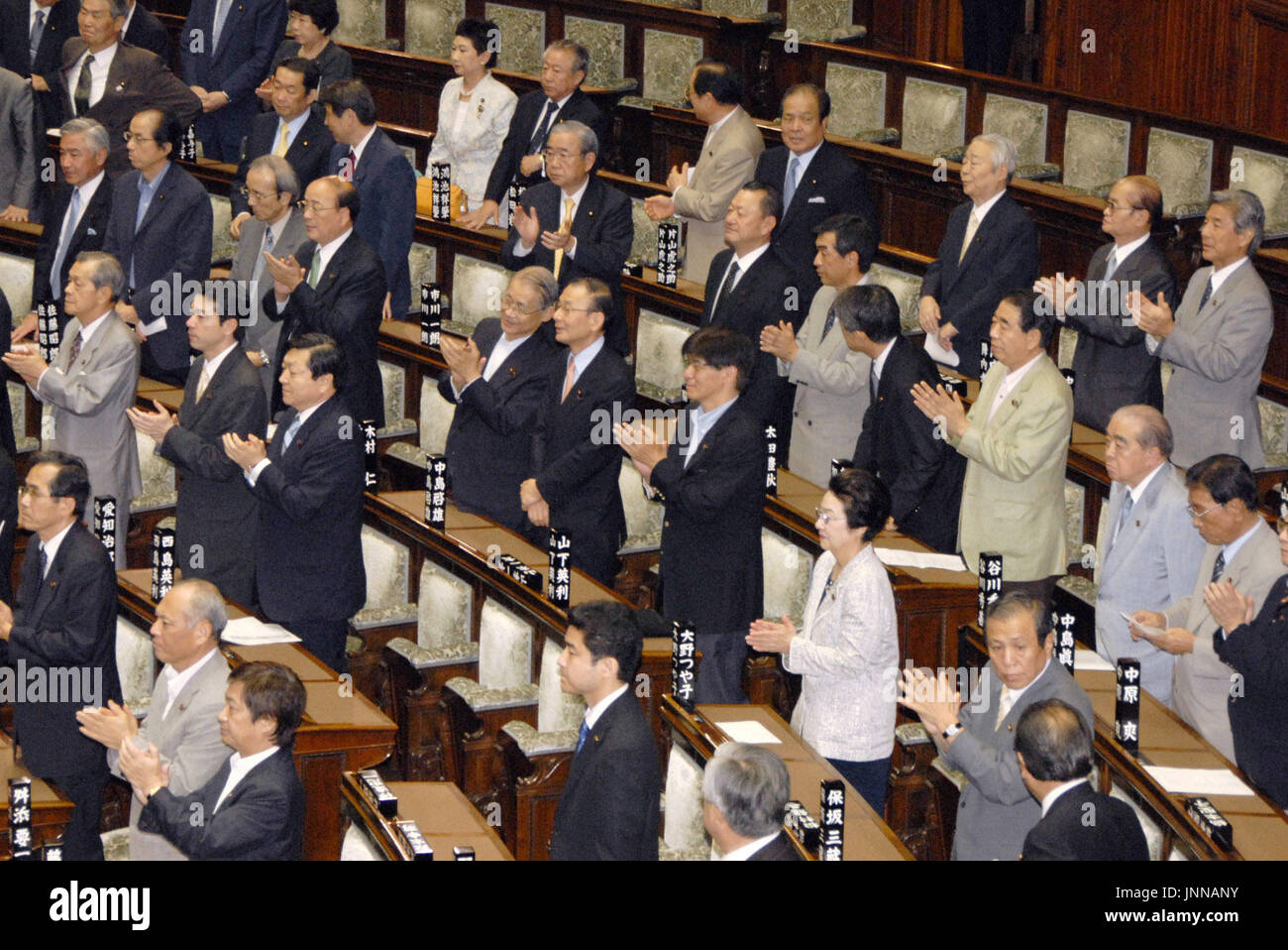 TOKYO, Japan Members of the Japanese House of Councillors clap their