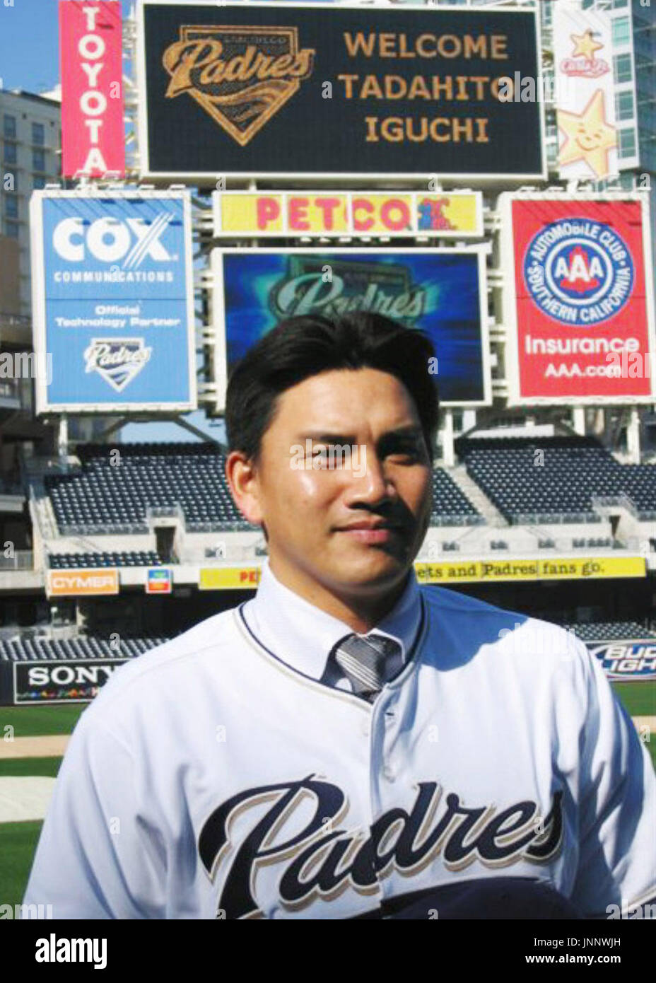 SAN DIEGO, United States - Tadahito Iguchi poses for photographers in his  new San Diago Padres uniform after he signed a one-year deal with the  Padres on Dec. 18. The 33-year-old infielder
