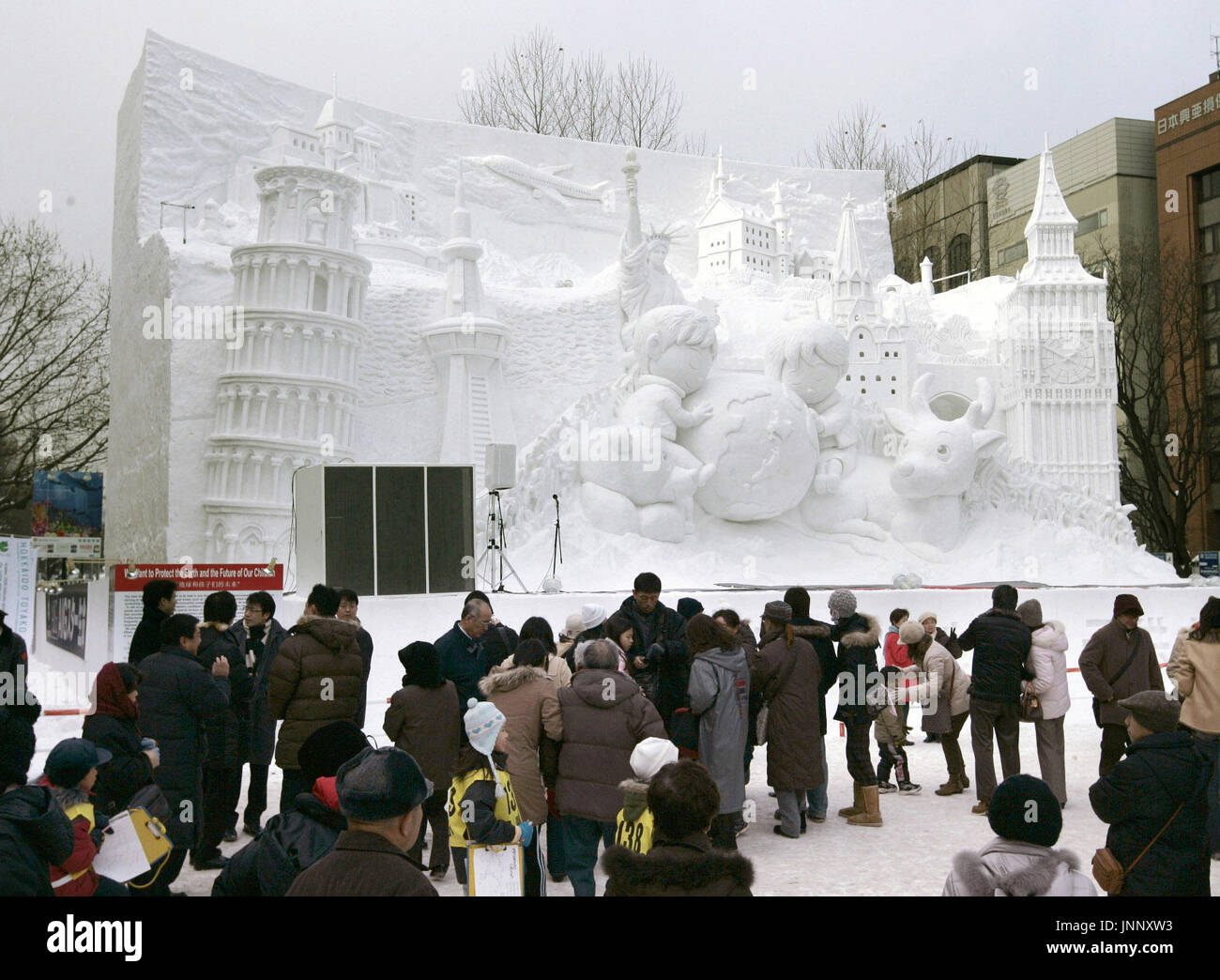 SAPPORO, Japan - Tourists flock to a huge snow statue in Odori Park in ...