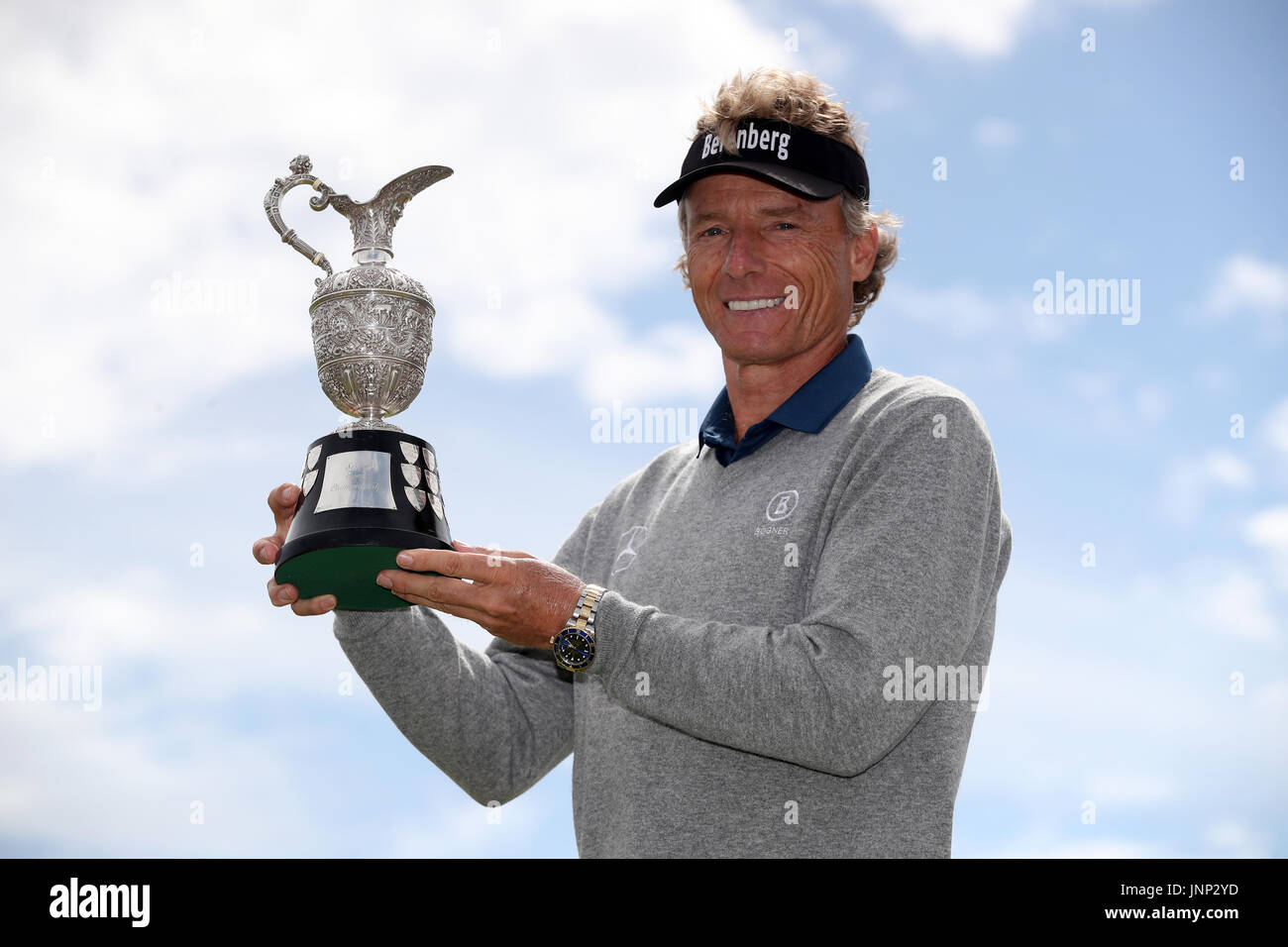 Germany's Bernhard Langer poses with teh trophy after winning the
