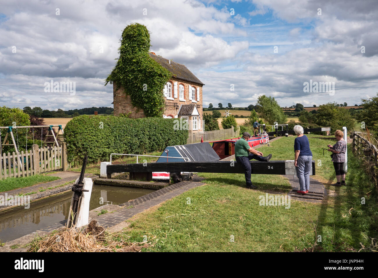 A historic working narrowboat at Somerton Deep Lock on the Oxford Canal