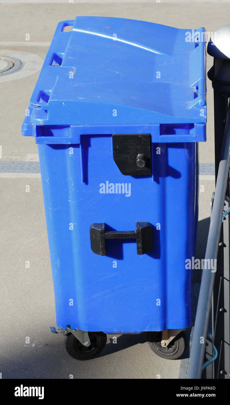 blue plastic reciyling bin for waste paper Stock Photo