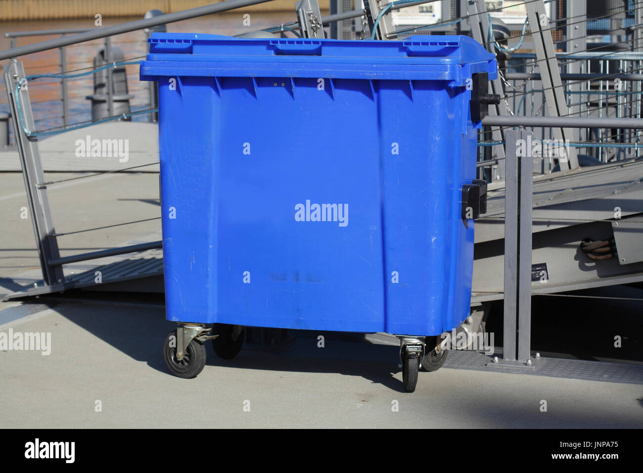blue plastic reciyling bin for waste paper Stock Photo