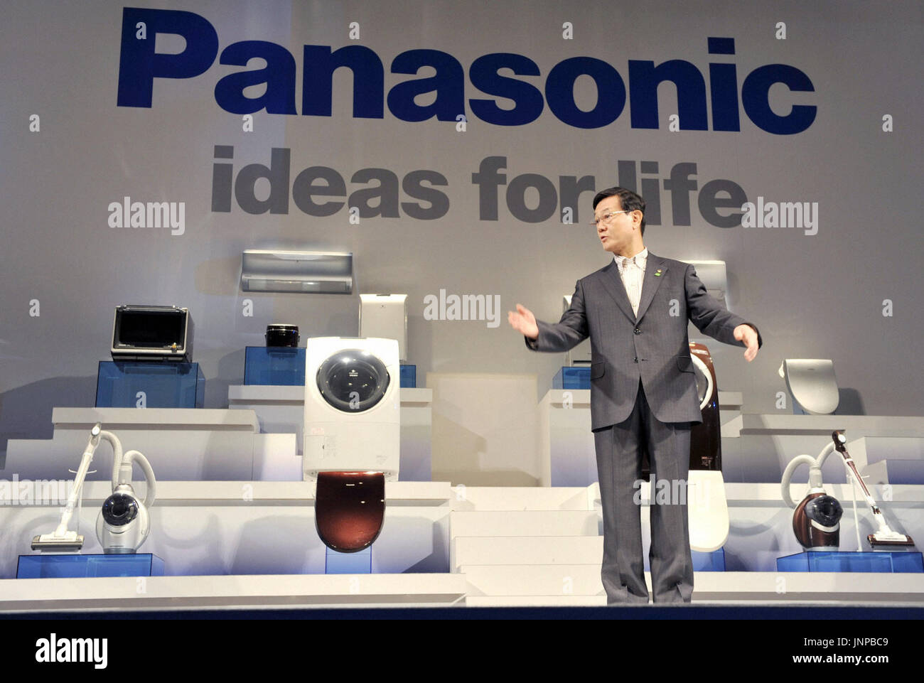 TOKYO, Japan - Fumio Otsubo, president of Matsushita Electric Industrial Co., poses with some of the company's white goods to be sold under the '' Panasonic'' brand for the first time, ahead of TOKYO, Japan - Fumio Otsubo, president of Matsushita Electric Industrial Co., poses with some of the company's white goods to be sold under the '' Panasonic'' brand for the first time, ahead of