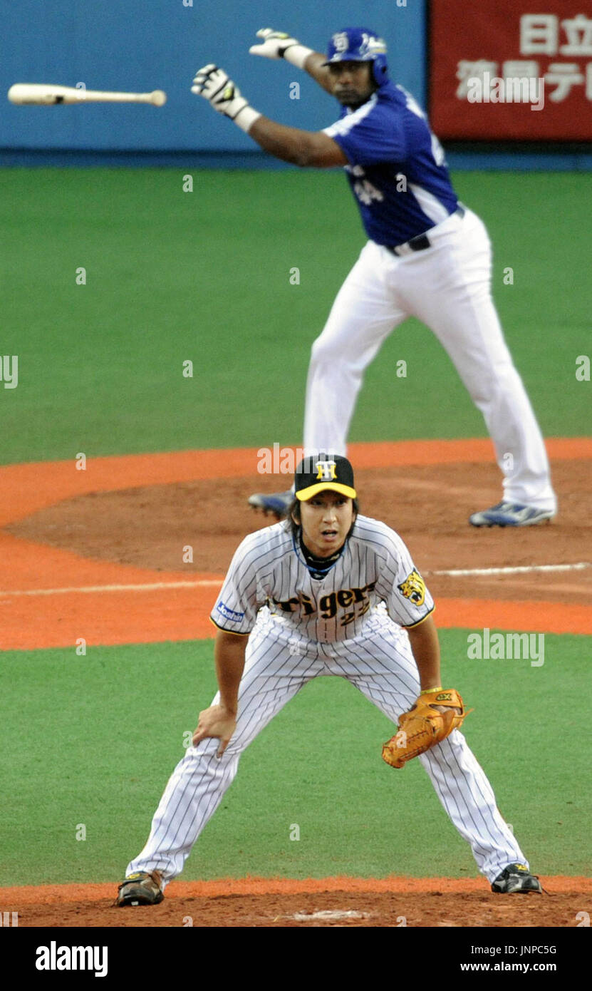 OSAKA, Japan - Hanshin Tigers closer Kyuji Fujikawa follows the ball Stock  Photo - Alamy