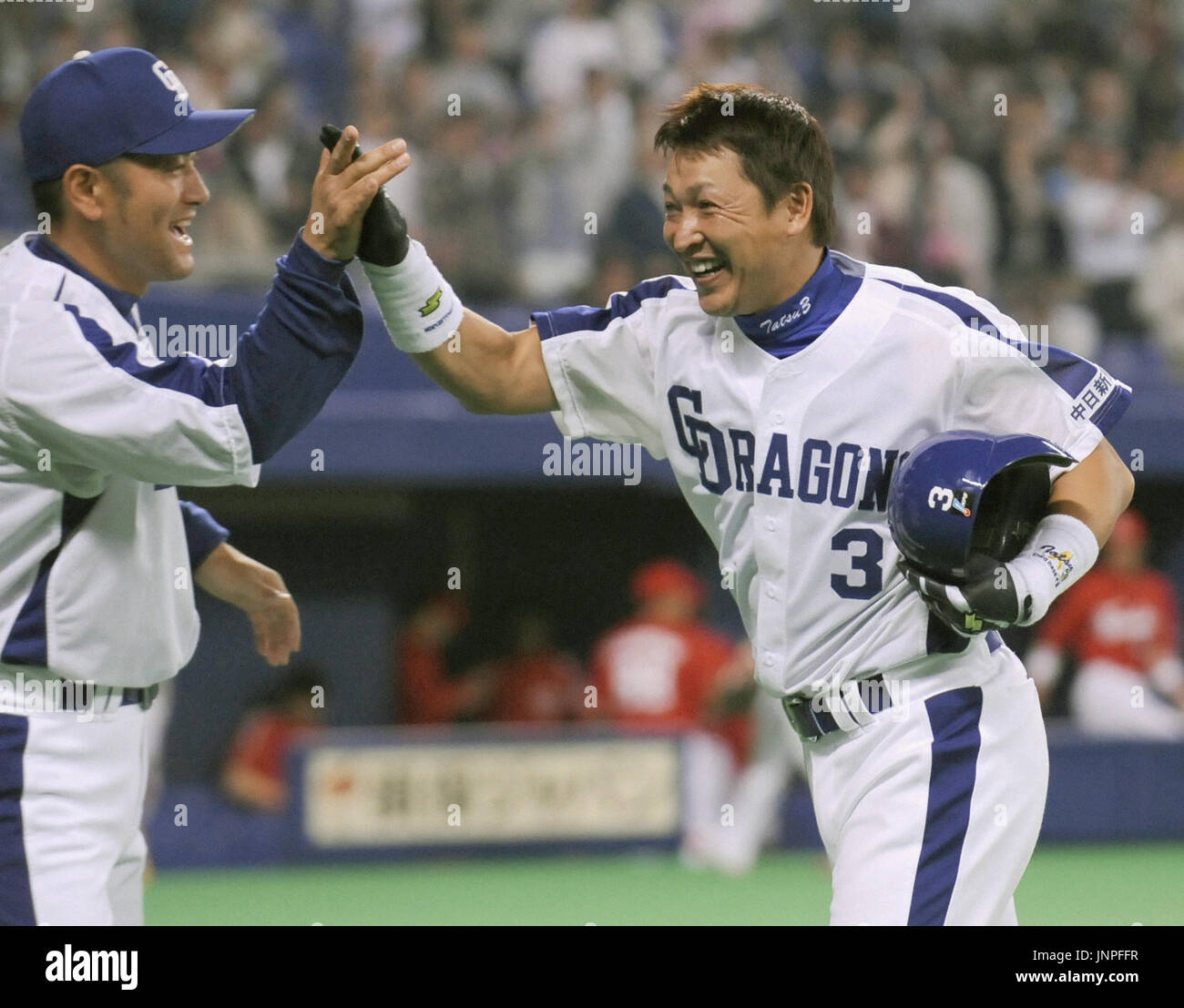 NAGOYA, Japan - Chunichi Dragons pinch hitter Kazuyoshi Tatsunami celebrates after singling in the game-winning run to beat the Hiroshima Carp 4-3 at Nagoya Dome on May 7