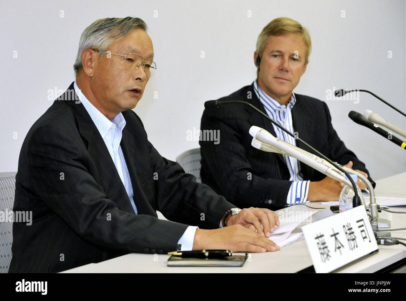 TOKYO, Japan Nippon Sheet Glass Co. Chairman Katsuji Fujimoto (L