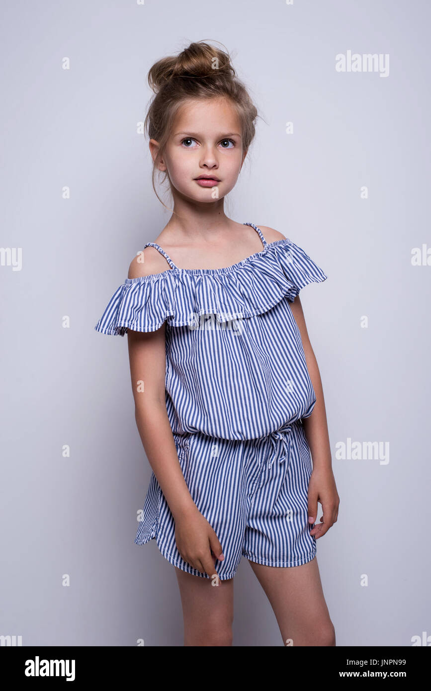 Beautiful Little Fashion Model On White Background Portrait Of Cute Beautiful Little Fashion Model On White Background Portrait Of Cute