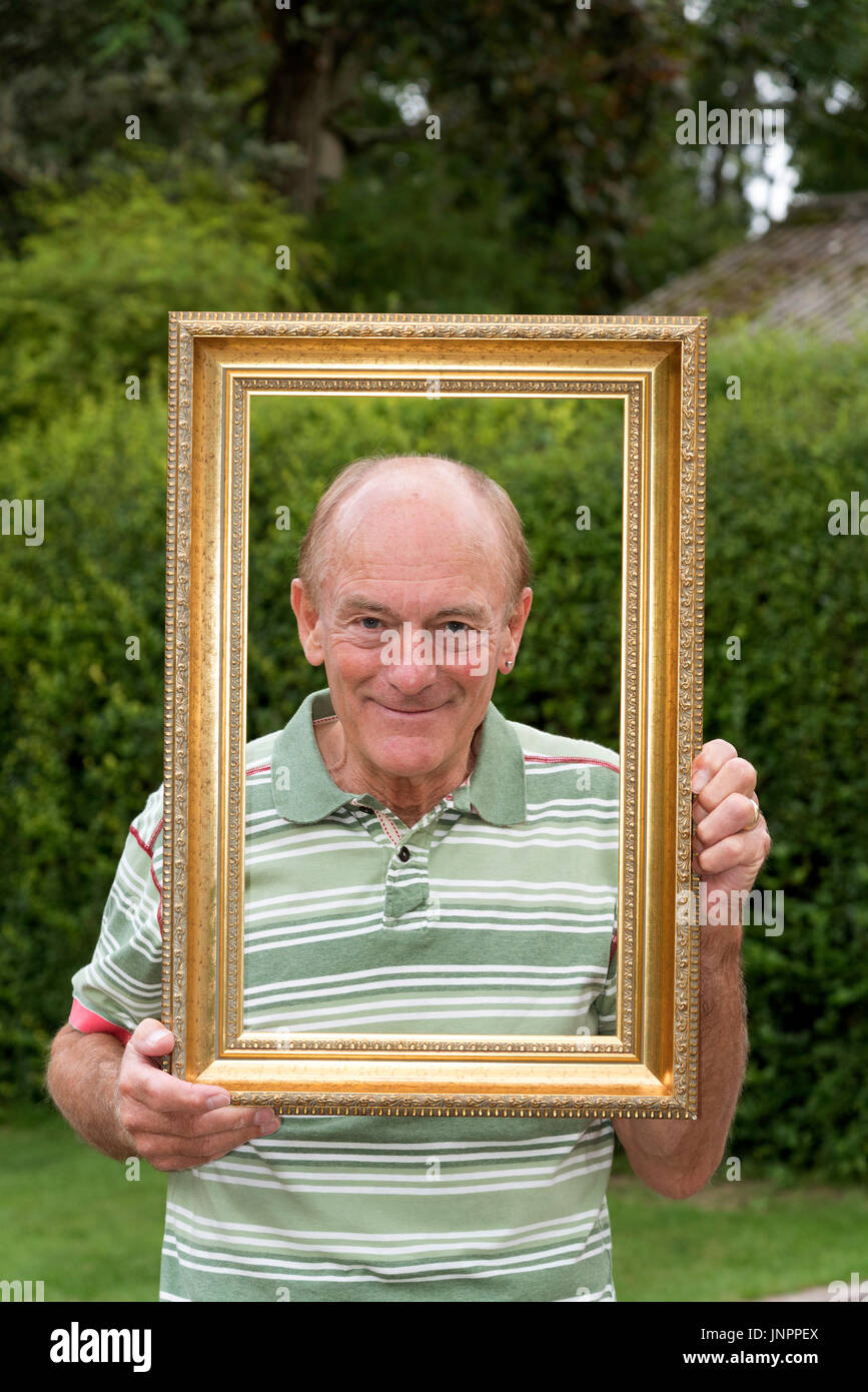 Portrait of an elderly man in a gold picture frame Stock Photo Alamy