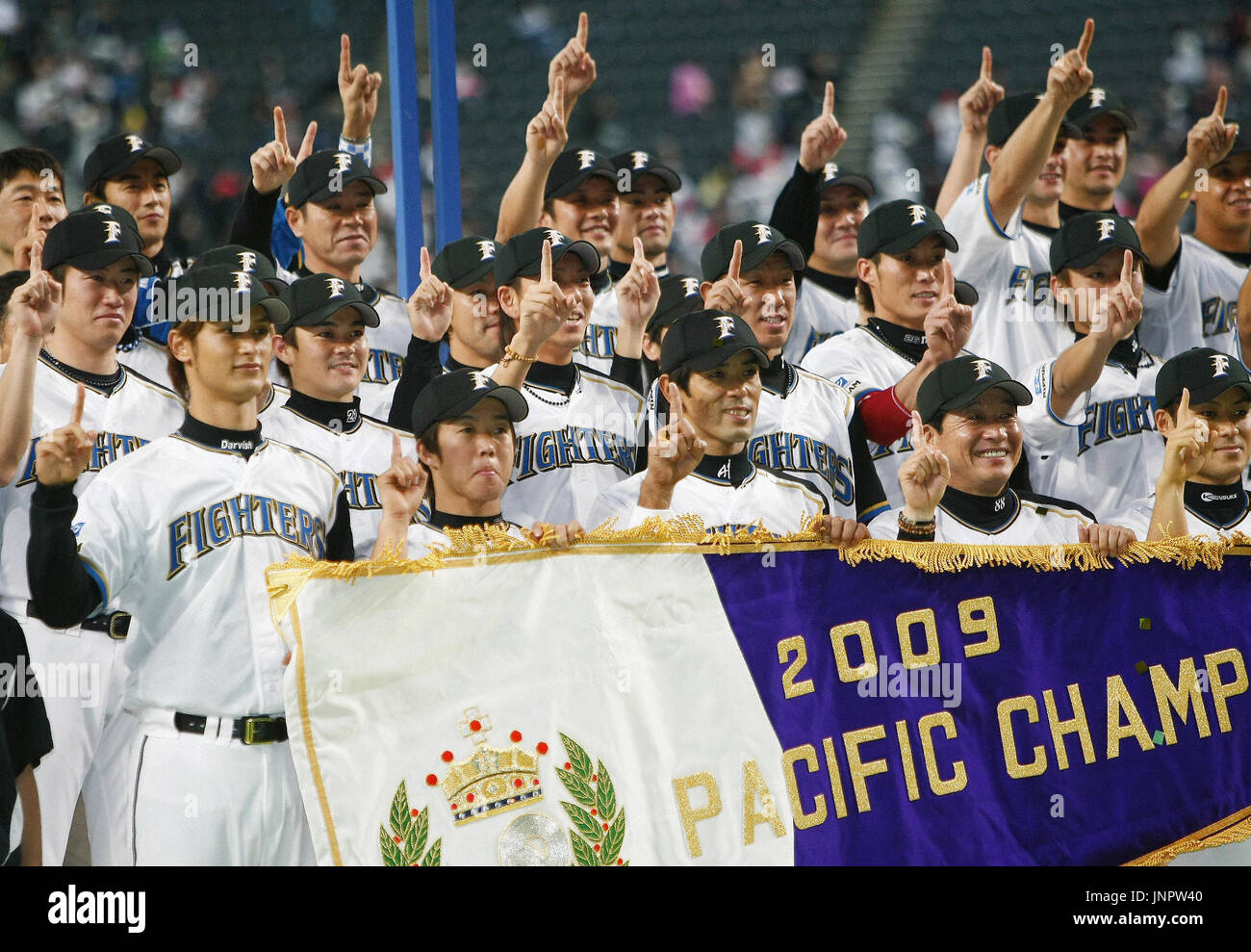 SAPPORO, Japan - Nippon Ham Fighters players celebrate after clinching ...