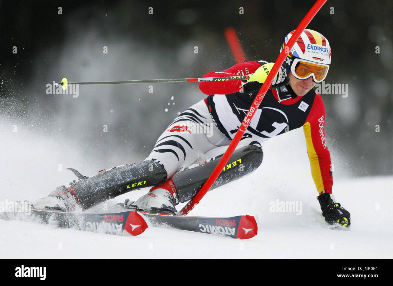 KITZBUEHEL, Austria - Felix Neureuther of Germany clears a gate during the men's slalom at the Alpine Skiing World Cup in Kitzbuehel, Austria, on Jan. 24, 2010. Neureuther finished in a two-run combined time of one minute 37.35 seconds to clinch his first World Cup victory. (Kyodo) Stock Photo