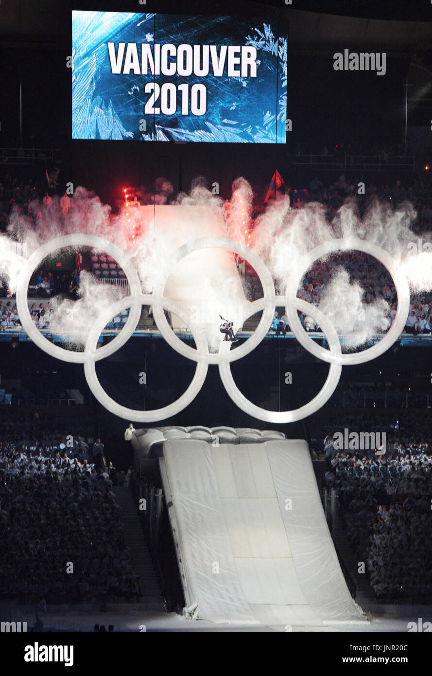 VANCOUVER Canada A Snowboarder Jumps Through The Olympic Rings vancouver-canada-a-snowboarder-jumps-through-the-olympic-rings