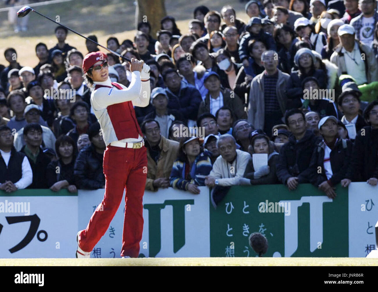 TOKYO, Japan - Ryo Ishikawa hits a tee shot on the 16th hole in the Nippon Series JT Cup at Tokyo Yomiuri Country Club on Dec. 6, 2009. The 18-year-old came 19th in the season's final tournament but became the youngest money champion in Japanese golf history. (Kyodo) Stock Photo
