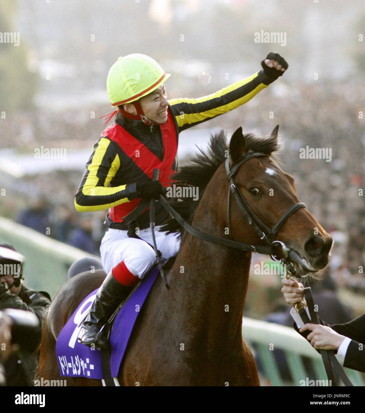FUNABASHI, Japan - Jockey Kenichi Ikezoe on Dream Journey celebrates ...