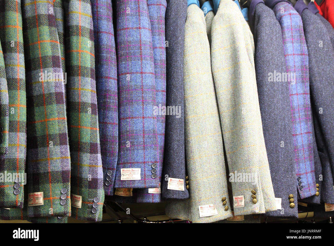 Harris Tweed jackets in an outlet shop in Tarbert, Harris and Lewis Stock Photo