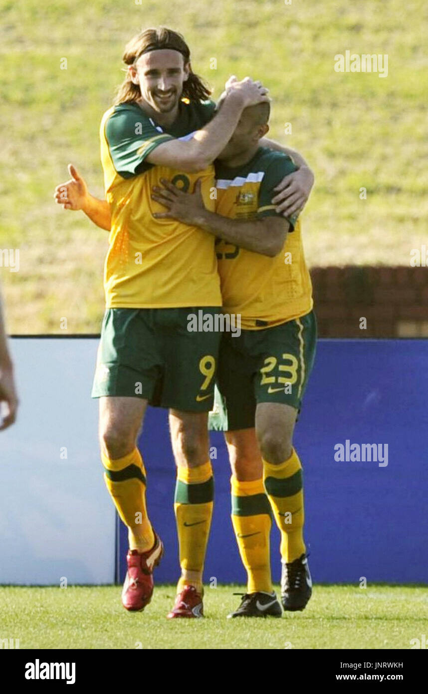 JOHANNESBURG, South Africa Australia's Joshua Kennedy (L) celebrates
