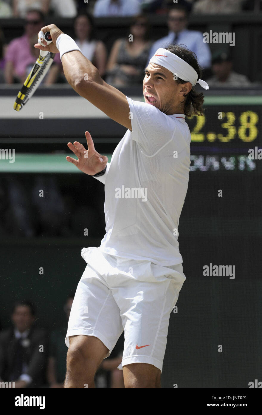 WIMBELDON, England - Rafael Nadal of Spain returns the ball to Tomas Berdych of the Czech Republic during the men's singles final at the Wimbledon tennis championships at the All England Tennis Club in London on July 4, 2010. Nadal won 6-3, 7-5, 6-4. (Kyodo) Stock Photo