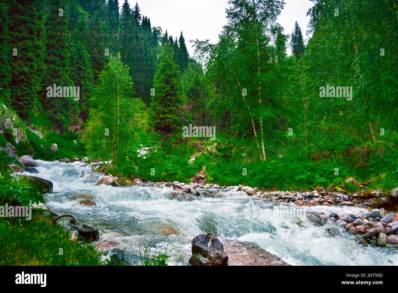 landscape river mountain cloudy sky Stock Photo - Alamy