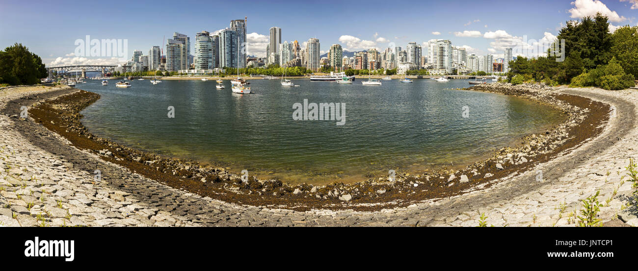 Panoramic Landscape of False Creek Seawall, Granville Marina and downtown highrise buildings in Vancouver British Columbia Canada Stock Photo