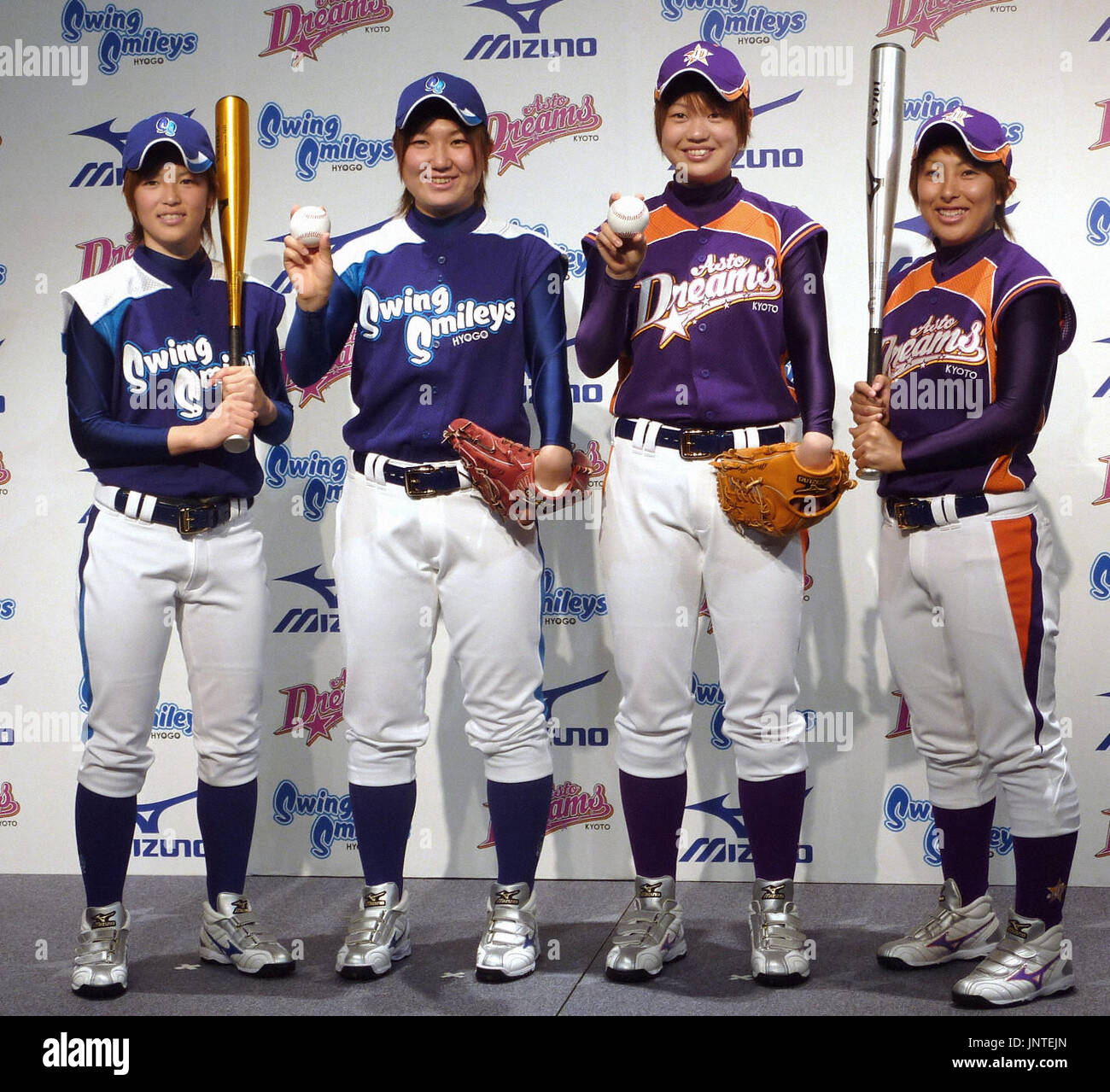OSAKA, Japan - Players from two teams in the to-be-inaugurated Girls  Professional Baseball League -- the Kyoto Asto Dreams and the Hyogo Swing  Smileys -- show off their jerseys on March 5,