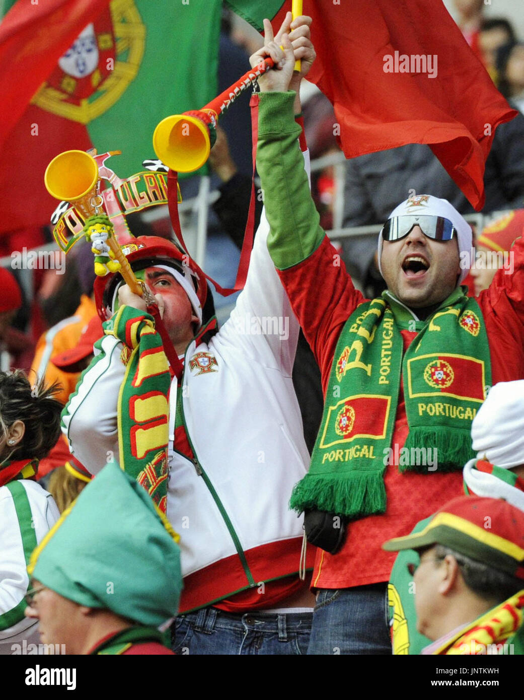 PORT ELIZABETH, South Africa Portugal supporters cheer at the first