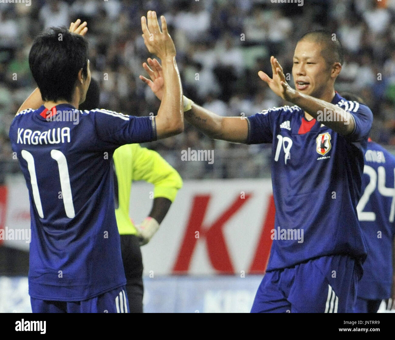 OSAKA, Japan - Japan forward Takayuki Morimoto (R) celebrates with 