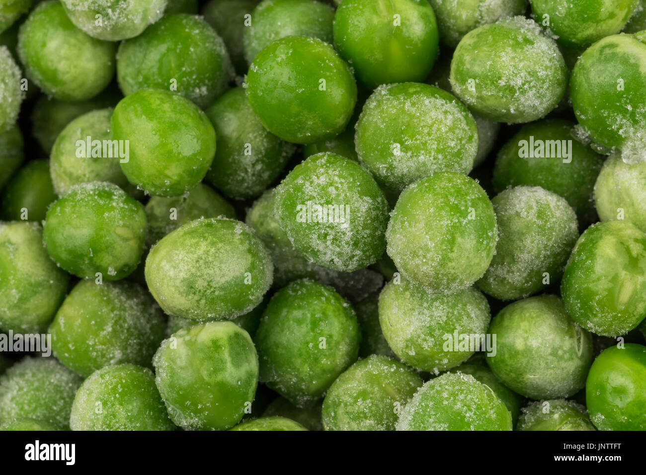 Green frozen raw peas vegetable for background Stock Photo Alamy