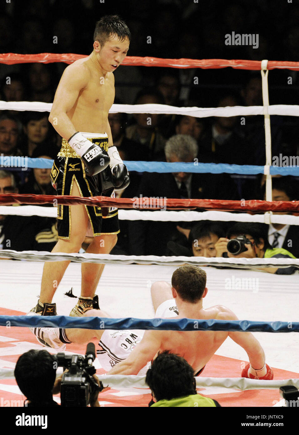 NAGOYA, Japan Challenger Takahiro Ao of Japan knocks down WBC super