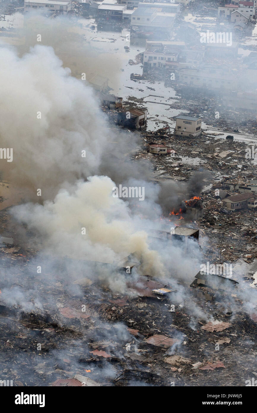 Kesennuma Japan Smoke Rises From Fires In The Tsunami Hit City