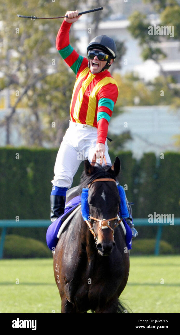 OSAKA, Japan - Italian jockey Umberto Rispoli, riding Kinshasa No ...
