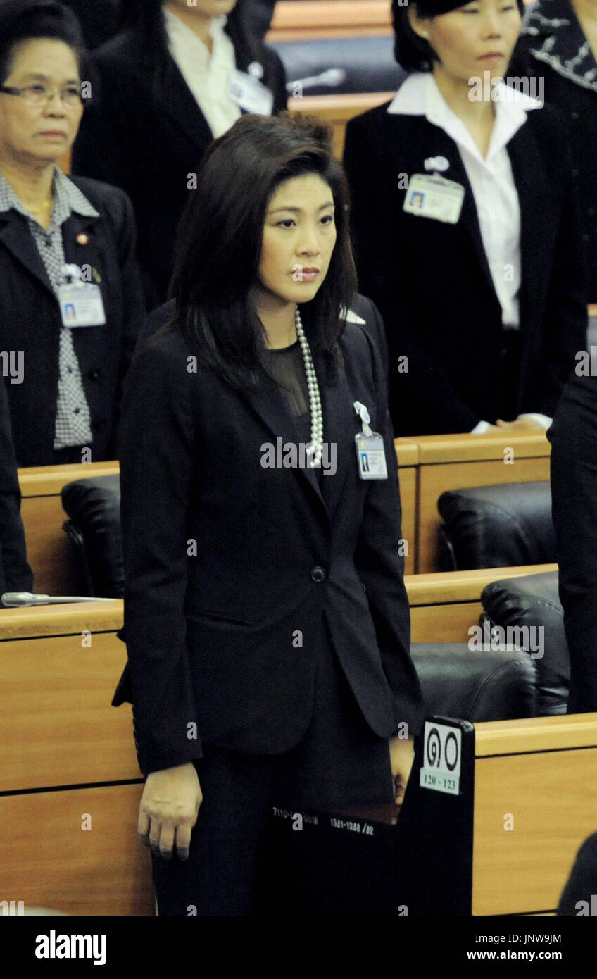 BANGKOK, Thailand Yingluck Shinawatra (C) attends a House of
