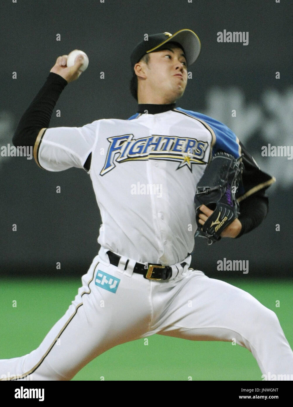 SAPPORO, Japan - Nippon Ham Fighters right-hander Yuki Saito pitches Stock  Photo - Alamy