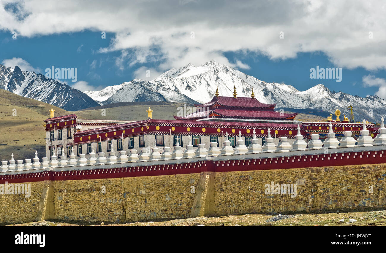 View on tradtitional tibetan monastery by Tagong grassland in China ...