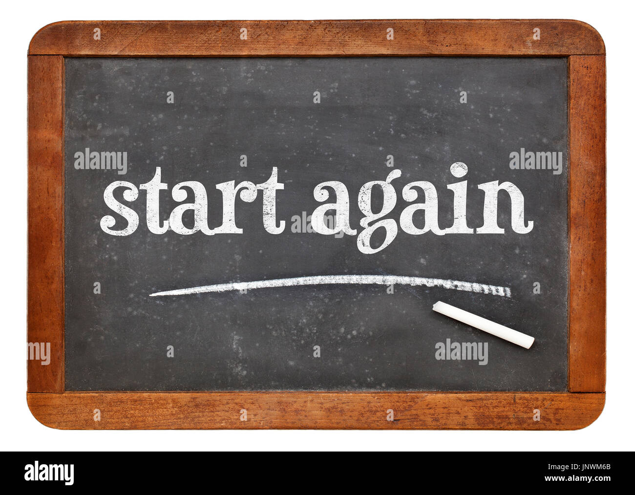 start again sign - white chalk text on a vintage slate blackboard Stock Photo