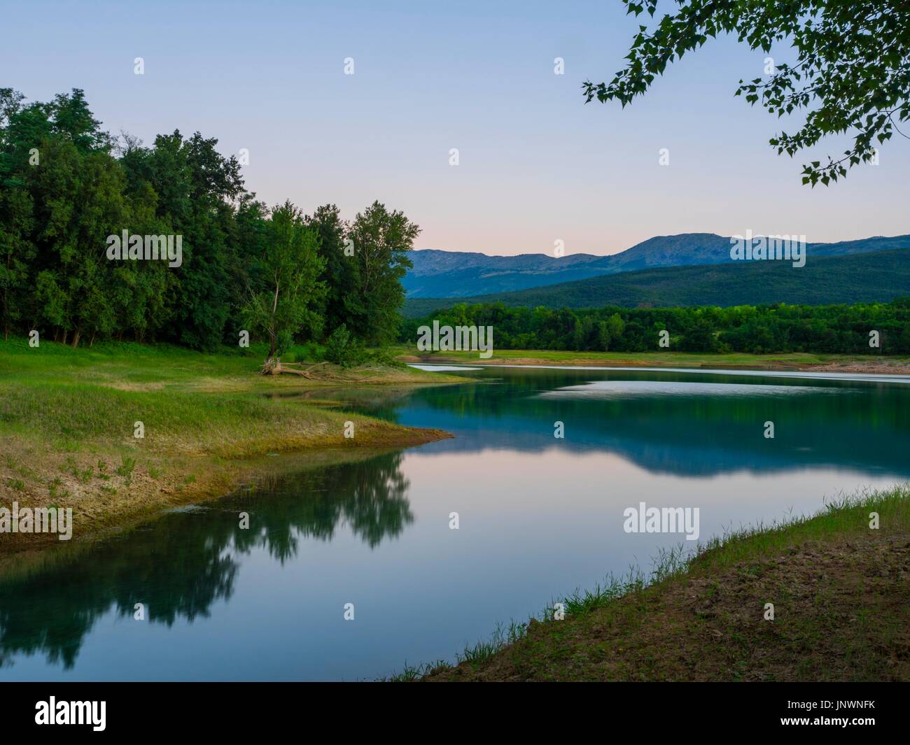 Peruca lake in Croatia dusk evening time calm calmness Stock Photo