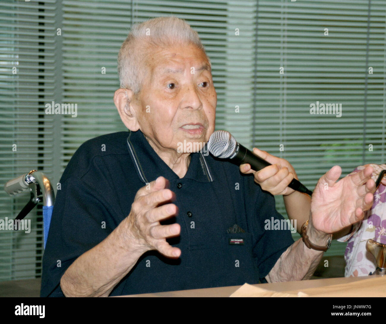 TOKYO, Japan - Photo shows the late Tsutomu Yamaguchi speaking in Nagasaki in June 2009 about his experience of surviving the 1945 atomic bombings of Hiroshima and Nagasaki. The Japanese Embassy in London has sent a written protest against the BBC for introducing him as ''The Unluckiest Man in the World'' in its TV program that aired on Dec. 17, 2010, with the show's personalities and the audience laughing. A producer of the show has apologized via e-mail. (Kyodo) Stock Photo
