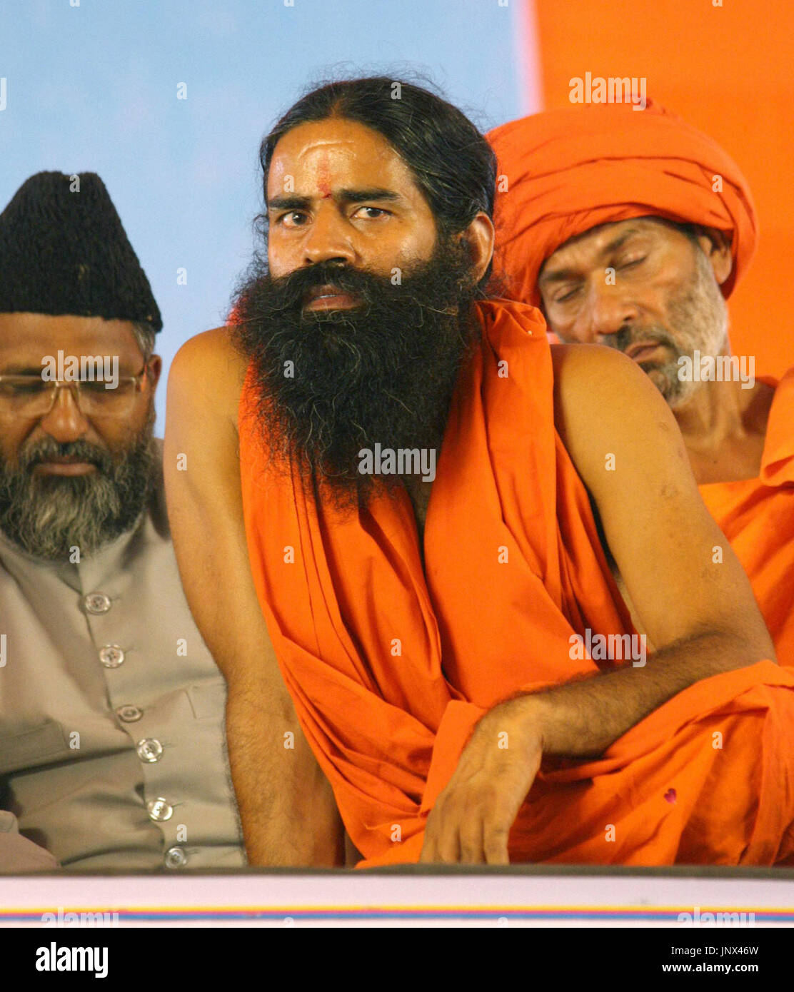 NEW DELHI, India - Influential Hindu yogi Swami Ramdev (C) is pictured ...