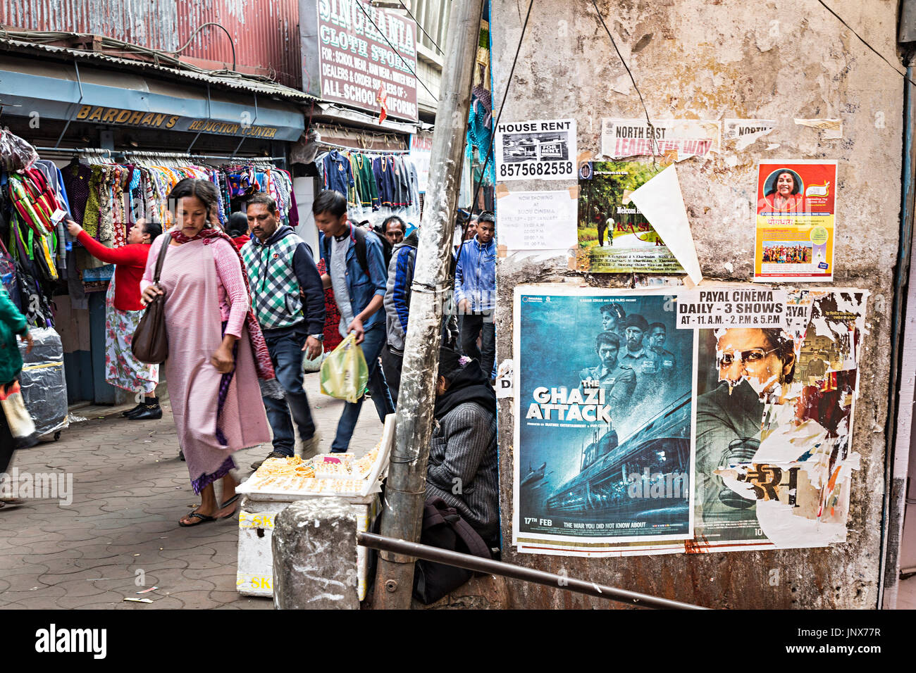 Cinema posters on wall in shopping street, Shillong, Meghalaya, India Stock Photo