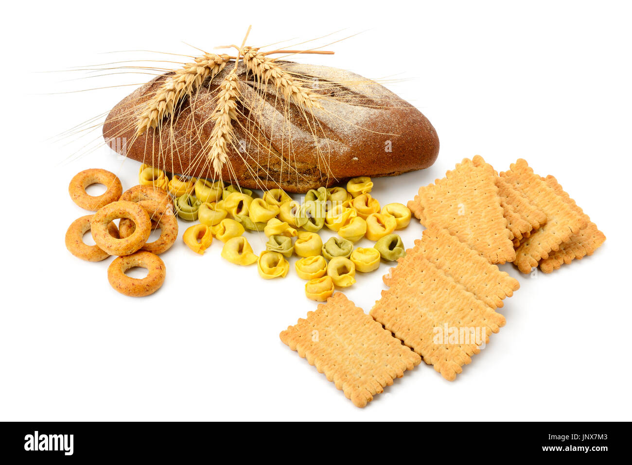 wheat products isolated on white background. Cookies, ravioli, bagels, bread, wheat ears. Healthy food. Stock Photo