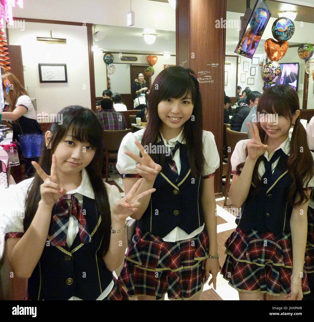 Tokyo Japan Staff Members Pose For Photos At Akb48 Cafe Shop Akihabara In Tokyo On Oct 24 11 The Outlet Showcasing Merchandise Featuring The Heavily Promoted All Girl Pop Group Opened Tokyo Japan Staff Members Pose For Photos At Akb48 Cafe Shop Akihabara In Tokyo On Oct 24 11 The Outlet Showcasing Merchandise Featuring The Heavily Promoted All Girl Pop Group Opened