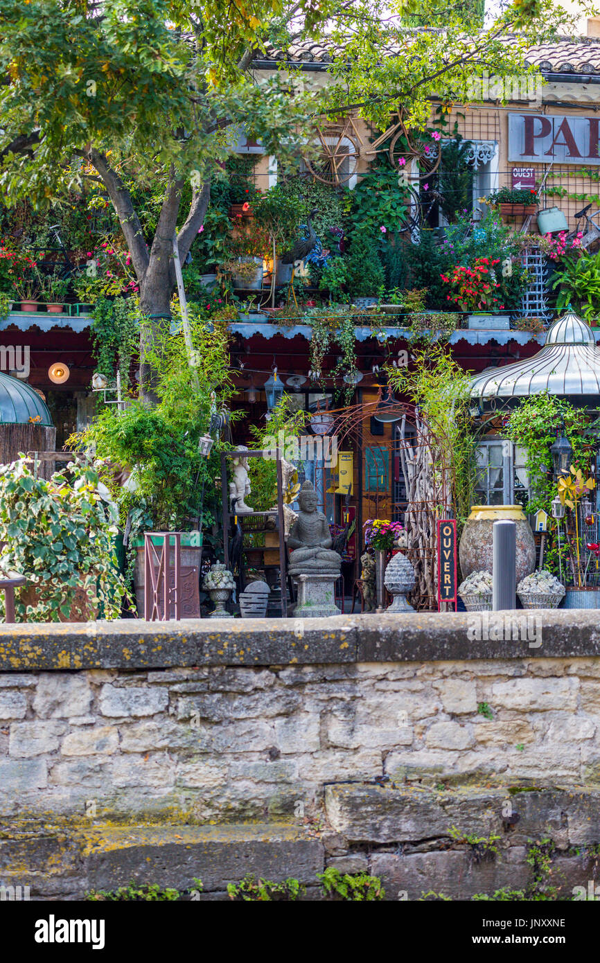 Isle-sur-la-Sorgue, Provence, France - October 9, 2015: Exterior of antiques shop in Isle-sur-la-Sorgue, Provence France. Isle-sur-la-Sorgue is famous for its antique and brocante shops. Stock Photo