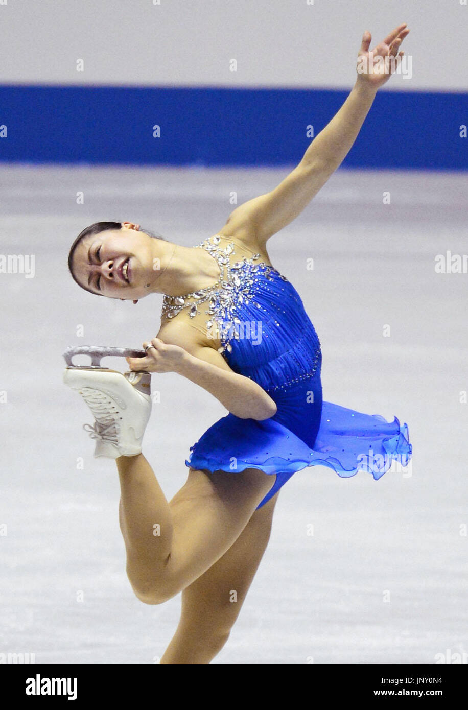 TOKYO, Japan - Akiko Suzuki performs during the free skate of the ISU World Team Trophy in Tokyo on April 21, 2012. She captured the women's title with a personal best score as host Japan won the competition for the first time. (Kyodo) Stock Photo