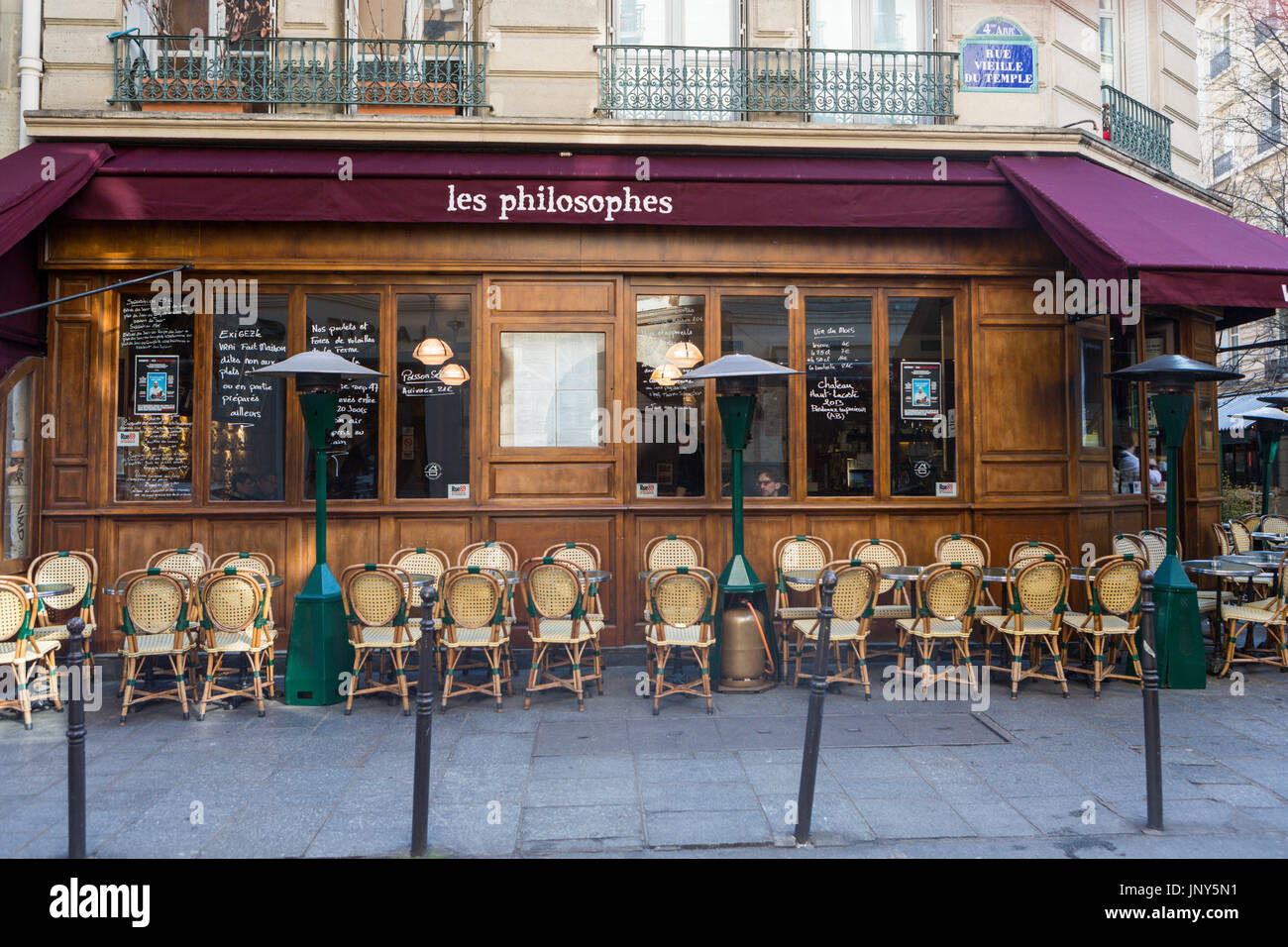 Paris, France - February 29, 2016: Les Philosophes cafe on rue Vieille du Temple in the Marais, Paris, France in the early morning at opening time. Stock Photo