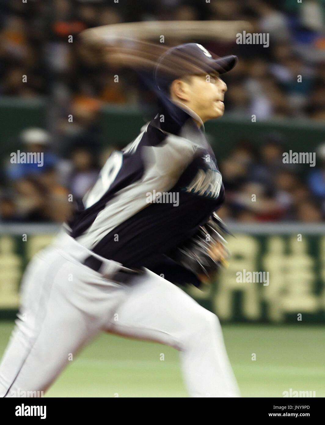TOKYO, Japan Hisashi Iwakuma of the Seattle Mariners pitches in an
