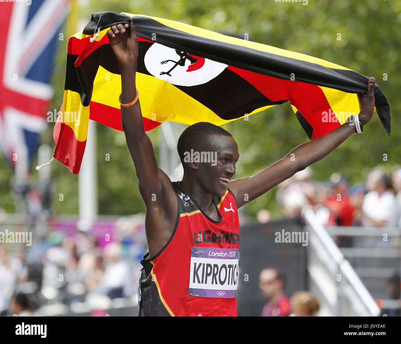 LONDON, Britain Uganda's Stephen Kiprotich responds to cheers with a