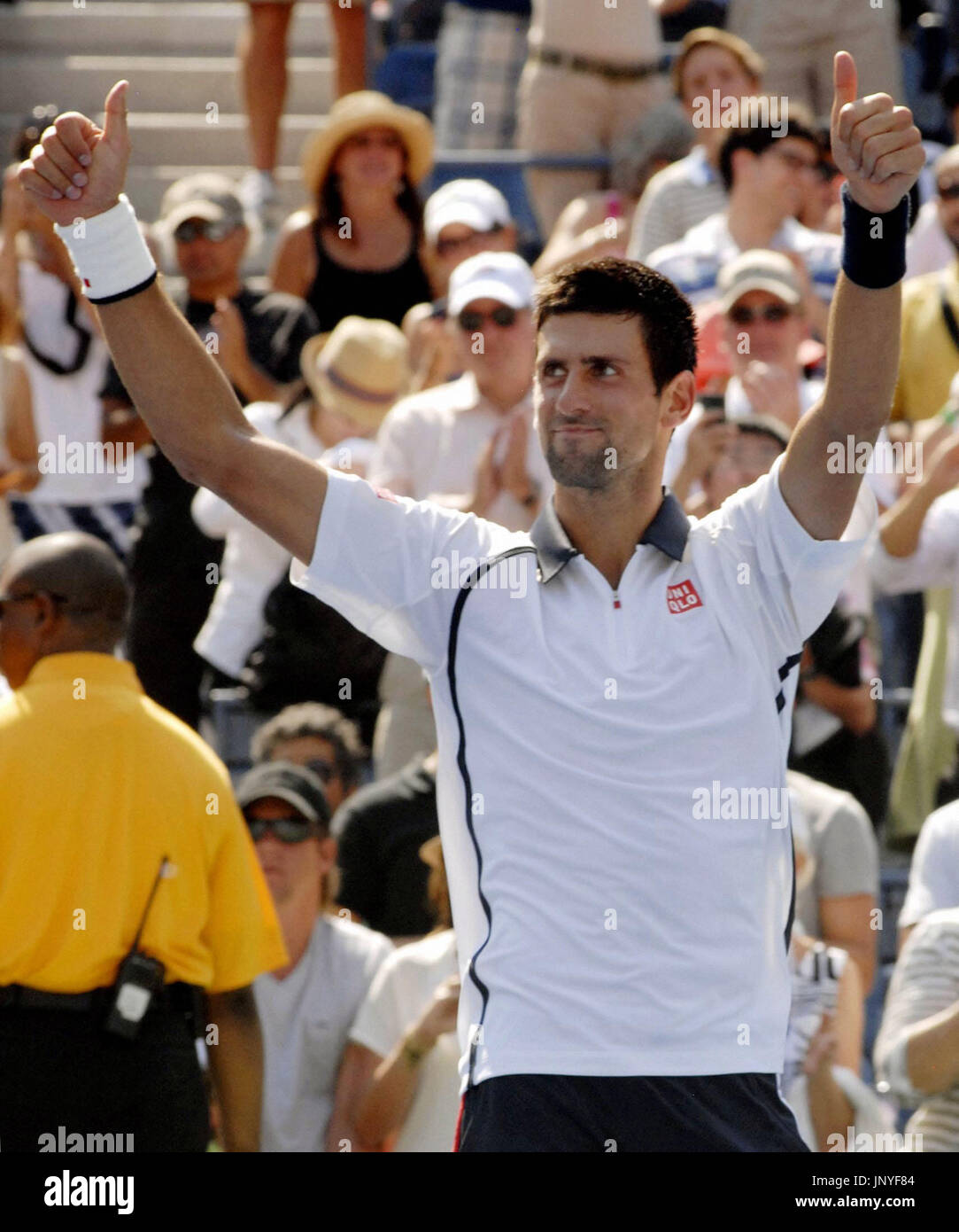 NEW YORK, United States - Serbia's Novak Djokovic responds to cheers after winning in his second round men's singles match against Brazil's Rogerio Dutra Silva at the U.S. Open championship in New York on Aug. 31, 2012. Djokovic advanced to the third round. (Kyodo) Stock Photo